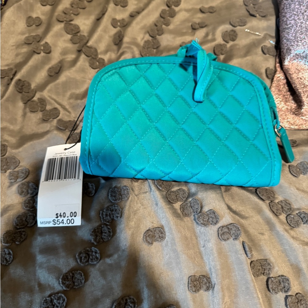 Chic Blue Cosmetic Bag with Structured Design and Glossy Finish